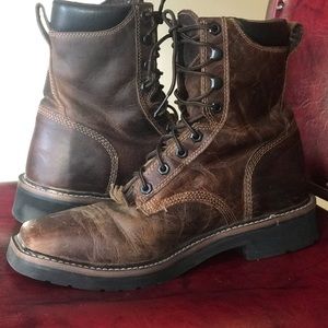 Justin leather, lace up steeled toe boots. Size 9